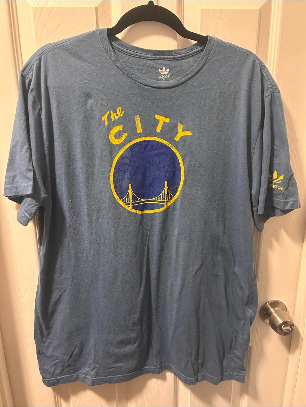 adidas women’s Light Blue 'The City' Graphic Tee with Yellow Navy Print